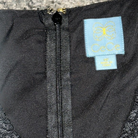 Woman’s knit Cece dress. In black with layered pleated bottom. Size 10p. - Picture 2 of 6